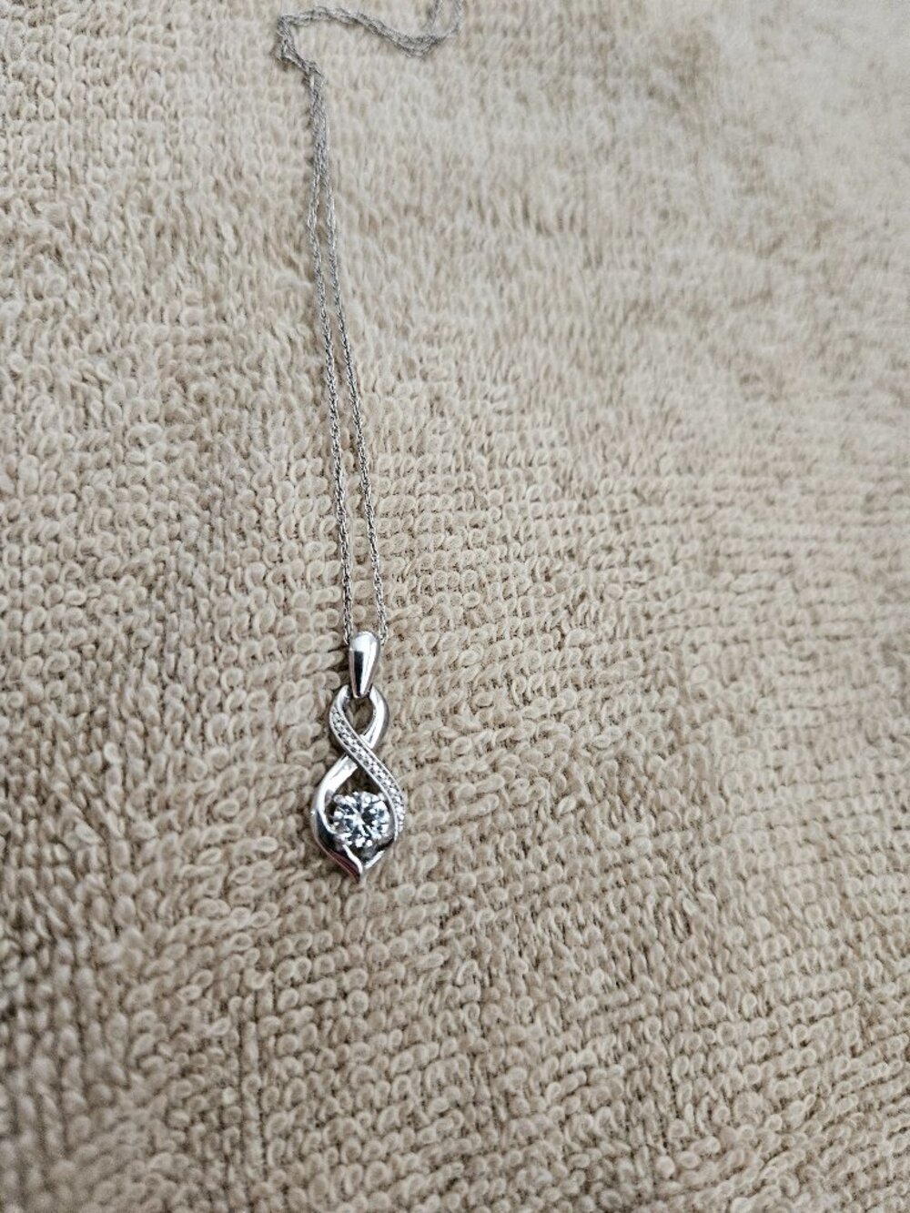 Sterling Silver lab created diamond necklace.